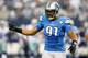ARLINGTON, TX - JANUARY 04: Defensive end Jason Jones #91 of the Detroit Lions reacts in the first quarter against the Dallas Cowboys during the NFC Wildcard Playoff Game at AT&T Stadium on January 4, 2015 in Arlington, Texas. (Photo by Ronald Martinez/Getty Images)