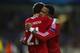 Herrera and Memphis celebrate a goal against Club Brugge earlier this season.