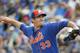 New York Mets' starting pitcher Matt Harvey throws during the first inning of an exhibition spring training baseball game against the Houston Astros, Thursday, March 24, 2016, in Port St. Lucie, Fla. (AP Photo/Brynn Anderson)