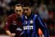 Inter Milan's, Ibrahim Maaroufi, right, battles for the ball with Sheffield FC's Darren Holmes, during their soccer exhibition match at Bramall Lane, Sheffield, England. The match is celebrating 150 years since the formation of Sheffield FC, the worlds first soccer club and is being watched by Brazilian great, Pele. Thursday, Nov. 8, 2007. (AP Photo/Simon Dawson)