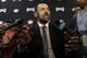 Retired Sacramento Kings center Vlade Divac, of Serbia, talks with reporters before the Kings played the Atlanta Hawks in NBA basketball game in Sacramento, Calif., Monday, March 16, 2015. Divac has recently been named the Kings Vice President of Basketball and Franchise Operations.(AP Photo/Rich Pedroncelli)
