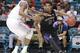 LAS VEGAS, NV - MARCH 10: Marquese Chriss #0 of the Washington Huskies handles the ball against Elgin Cook #23 of the Oregon Ducks during a quarterfinal game of the Pac-12 Basketball Tournament at MGM Grand Garden Arena on March 10, 2016 in Las Vegas, Nevada. (Photo by Leon Bennett/Getty Images)