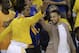 Golden State Warriors' Stephen Curry, right, and Shaun Livingston celebrate a score against the Houston Rockets from the bench during the first half in Game 5 of a first-round NBA basketball playoff series Wednesday, April 27, 2016, in Oakland, Calif. (AP Photo/Ben Margot)