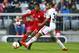 Ingolstadt's Marvin Matip, right, and Bayern’s Kingsley Coman challenge for the ball during the German Bundesliga soccer match between FC Bayern Munich and FC Ingolstadt 04 at the Allianz Arena stadium in Munich, Germany, Saturday, Dec. 12, 2015. (AP Photo/Matthias Schrader)