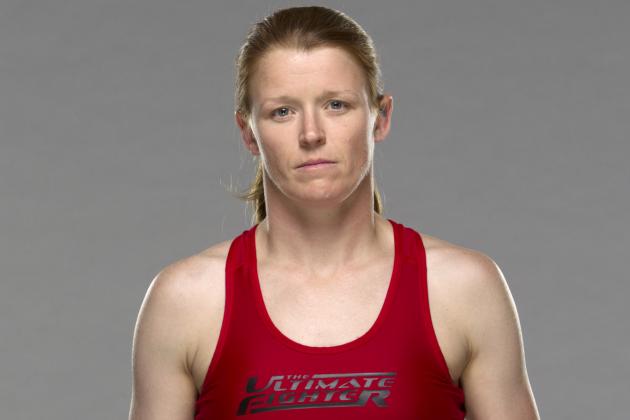 MMA Champion Tonya Evinger Defends Title, Surprises Announcer with a Kiss