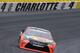 Martin Truex Jr races out of Turn 4 during the NASCAR Sprint Cup series auto race at Charlotte Motor Speedway in Concord, N.C., Sunday, May 29, 2016. (AP Photo/Chuck Burton)