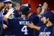 PHOENIX, AZ - JULY 05: Wil Myers #4 of the San Diego Padres is congratulated by teammates after scoring against the Arizona Diamondbacks during the third inning at Chase Field on July 5, 2016 in Phoenix, Arizona. (Photo by Jennifer Stewart/Getty Images)