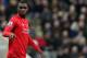 Liverpool's Christian Benteke during the English Premier League soccer match between Newcastle United and Liverpool at St James' Park, Newcastle, England, Sunday, Dec. 6, 2015. (AP Photo/Scott Heppell)