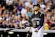 Aug 6, 2016; Denver, CO, USA; Colorado Rockies right fielder Carlos Gonzalez (5) tosses his bat after striking out in the sixth inning against the Miami Marlins at Coors Field. Mandatory Credit: Isaiah J. Downing-USA TODAY Sports