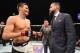 LAS VEGAS, NV - FEBRUARY 06: (R-L) Phil 'CM Punk' Brooks faces off with Mickey Gall after Gall's victory over Mike Jackson during the UFC Fight Night event at MGM Grand Garden Arena on February 6, 2016 in Las Vegas, Nevada. (Photo by Jeff Bottari/Zuffa LLC/Zuffa LLC via Getty Images)