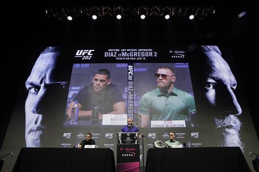 Nate Diaz, Conor McGregor Throw Bottles, Cans, Forcing End to UFC 202 Presser