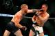 March 5, 2016; Las Vegas, NV, USA; Conor McGregor (left) punches Nate Diaz in the face during UFC 196 at MGM Grand Garden Arena. Mandatory Credit: Mark J. Rebilas-USA TODAY Sports