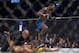 Aug 20, 2016; Las Vegas, NV, USA; Glover Teixeria (blue gloves) reacts during fight against Anthony Johnson (red gloves) during UFC 202 at T-Mobile Arena. Mandatory Credit: Joshua Dahl-USA TODAY Sports