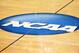 GREENSBORO, NC - MARCH 16: A view of the NCAA logo at center court during a game between the Vermont Catamounts and the North Carolina Tar Heels in the second round of the 2012 NCAA Men's Basketball Tournament at Greensboro Coliseum on March 16, 2012 in Greensboro, North Carolina. (Photo by Lance King/Getty Images)
