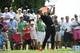 Spectators watch Rickie Fowler tee off from the 17th hole during the second round of The Barclays golf tournament in Farmingdale, N.Y., Friday, Aug. 26, 2016, (AP Photo/Kathy Kmonicek)