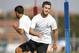 Juventus' Bosnian midfielder Miralem Pjanic (R)takes part in a training session on the eve of the UEFA Champions League football match Juventus vs FC Sevilla on September 13, 2016 at the Juventus Training Centre in Vinovo, near Turin. / AFP / MARCO BERTORELLO (Photo credit should read MARCO BERTORELLO/AFP/Getty Images)