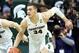 Jan 31, 2016; East Lansing, MI, USA; Michigan State Spartans forward Gavin Schilling (34) brings the ball up court against the Rutgers Scarlet Knights during the second half of a game at Jack Breslin Student Events Center. Mandatory Credit: Mike Carter-USA TODAY Sports
