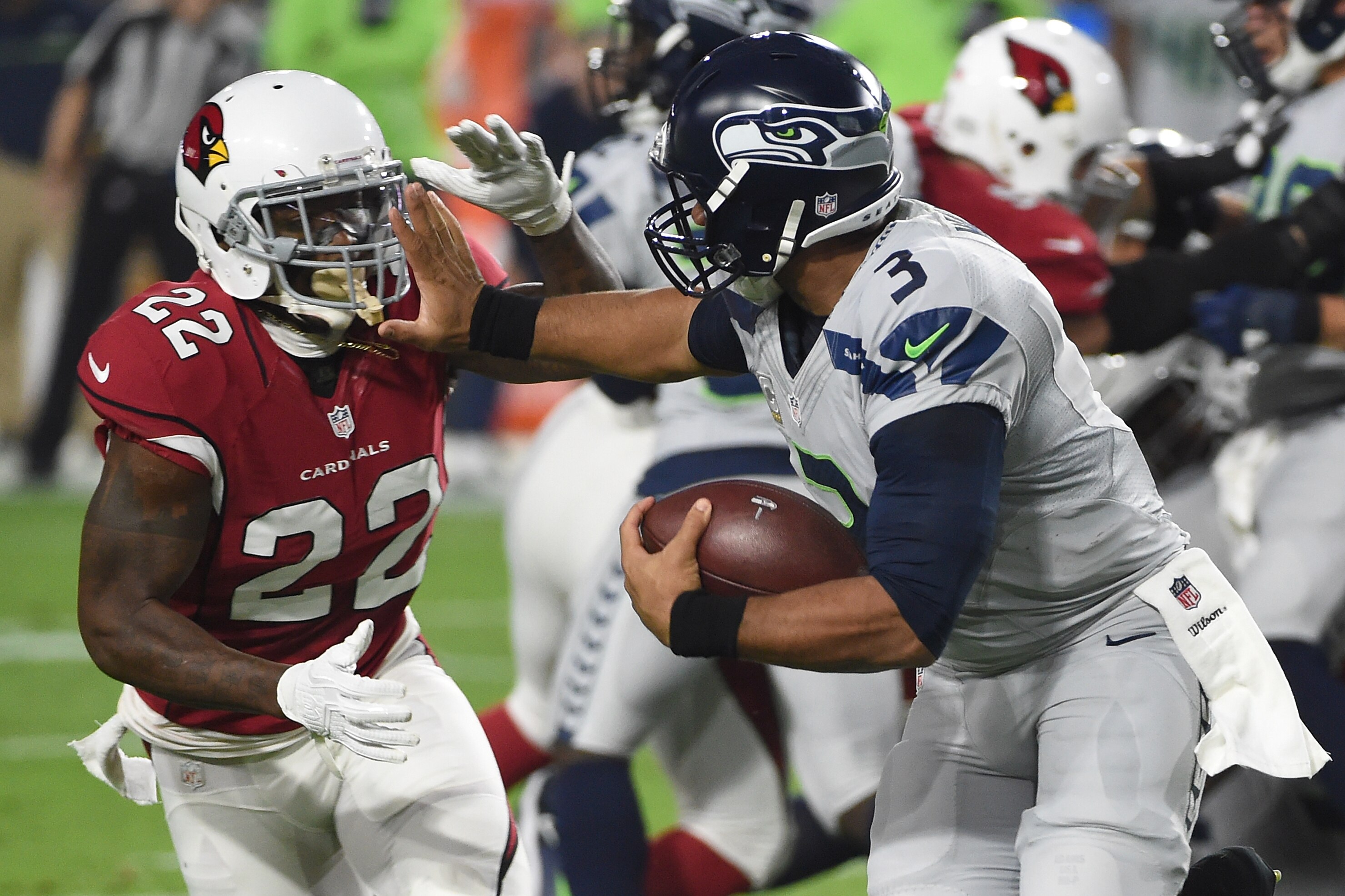 GLENDALE, AZ - OCTOBER 23:  Strong safety Tony Jefferson #22 of the Arizona Cardinals tackles quarterback Russell Wilson #3 of the Seattle Seahawks during the first quarter of the NFL game at University of Phoenix Stadium on October 23, 2016 in Glendale, Arizona.  (Photo by Norm Hall/Getty Images)
