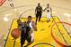 OAKLAND, CA - OCTOBER 25: Jonathon Simmons #17 of the San Antonio Spurs drives to the basket against Kevon Looney #5 of the Golden State Warriors on October 25, 2016 at ORACLE Arena in Oakland, California. NOTE TO USER: User expressly acknowledges and agrees that, by downloading and or using this photograph, user is consenting to the terms and conditions of Getty Images License Agreement. Mandatory Copyright Notice: Copyright 2016 NBAE (Photo by Noah Graham/NBAE via Getty Images)