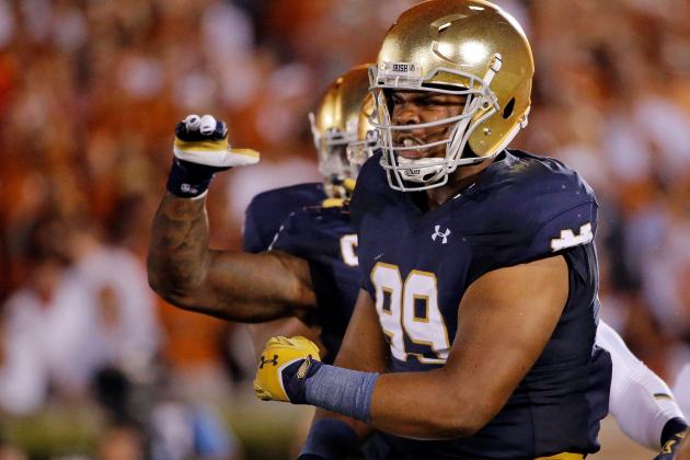 Notre Dame DL Jerry Tillery Kicks USC RB Aca'Cedric Ware in Head