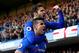 LONDON, ENGLAND - DECEMBER 11: Diego Costa (bottom) of Chelsea celebrates scoring the opening goal with his team mate Cesc Fabregas (top) during the Premier League match between Chelsea and West Bromwich Albion at Stamford Bridge on December 11, 2016 in London, England. (Photo by Clive Rose/Getty Images)