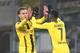 Dortmund's midfielder Mario Goetze (L) celebrates scoring the 1-1 with Dortmund's French midfielder Ousmane Dembele during the German first division Bundesliga football match between TSG Hoffenheim and BVB Borussia Dortmund at the Wirsol Rhein-Neckar-Arena in Sinsheim, southern Germany, on December 16, 2016. / AFP / Daniel ROLAND / RESTRICTIONS: DURING MATCH TIME: DFL RULES TO LIMIT THE ONLINE USAGE TO 15 PICTURES PER MATCH AND FORBID IMAGE SEQUENCES TO SIMULATE VIDEO. == RESTRICTED TO EDITORIAL USE == FOR FURTHER QUERIES PLEASE CONTACT DFL DIRECTLY AT + 49 69 650050
(Photo credit should read DANIEL ROLAND/AFP/Getty Images)