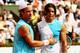 PARIS - JUNE 06: Rafael Nadal (R) of Spain shakes hands after beating Carlos Moya (L) of Spain during the Men's Singles Quarter Final match on day eleven of the French Open at Roland Garros on June 6, 2007 in Paris, France. (Photo by Clive Brunskill/Getty Images)