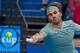 Roger Federer of Switzerland hits a return against Richard Gasquet of France during their twelth session men's singles match on day six of the Hopman Cup tennis tournament in Perth on January 6, 2017. / AFP / Tony ASHBY / IMAGE RESTRICTED TO EDITORIAL USE - STRICTLY NO COMMERCIAL USE (Photo credit should read TONY ASHBY/AFP/Getty Images)