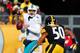 PITTSBURGH, PA - JANUARY 08: Matt Moore #8 of the Miami Dolphins drops back to pass while under pressure from Ryan Shazier #50 of the Pittsburgh Steelers in the first half during the Wild Card Playoff game at Heinz Field on January 8, 2017 in Pittsburgh, Pennsylvania. (Photo by Justin K. Aller/Getty Images)