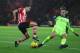 SOUTHAMPTON, ENGLAND - JANUARY 11: Cedric Soares of Southampton takes on Lucas Leiva of Liverpool during the EFL Cup semi-final first leg match between Southampton and Liverpool at St Mary's Stadium on January 11, 2017 in Southampton, England. (Photo by Ian Walton/Getty Images)