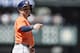 SEATTLE, WA - JULY 17: Jose Altuve #27 of the Houston Astros gestures to the crowd while standing on first base during a game against the Seattle Mariners at Safeco Field on July 17, 2015 in Seattle, Washington. The Astros won the game 8-1. (Photo by Stephen Brashear/Getty Images)