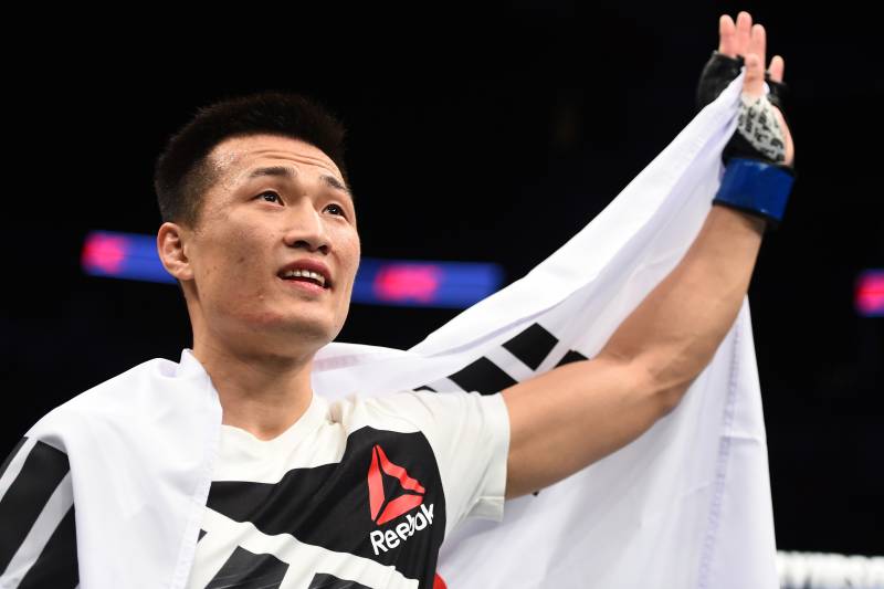 HOUSTON, TX - FEBRUARY 04: Chan Sung Jung of South Korea celebrates his victory over Dennis Bermudez in their featherweight bout during the UFC Fight Night event at the Toyota Center on February 4, 2017 in Houston, Texas. (Photo by Jeff Bottari/Zuffa LLC/Zuffa LLC via Getty Images)