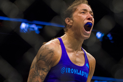 DALLAS, TX - MARCH 14: Germaine de Randamie celebrates after defeating Larissa Pacheco during UFC 185 at the American Airlines Center on March 14, 2015 in Dallas, Texas. (Photo by Cooper Neill/Zuffa LLC/Zuffa LLC via Getty Images)