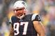 FOXBORO, MA - DECEMBER 24: Alan Branch #97 of the New England Patriots reacts during the first quarter of a game against the New York Jets at Gillette Stadium on December 24, 2016 in Foxboro, Massachusetts. (Photo by Billie Weiss/Getty Images)