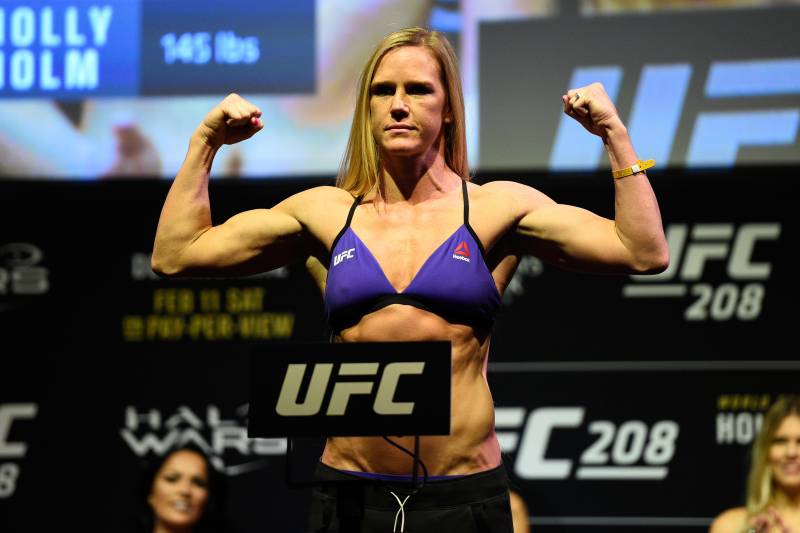 BROOKLYN, NEW YORK - FEBRUARY 10: Holly Holm poses on the scale during the UFC 208 weigh-in inside Kings Theater on February 10, 2017 in Brooklyn, New York. (Photo by Jeff Bottari/Zuffa LLC/Zuffa LLC via Getty Images)