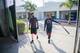 FORT MYERS, FL - FEBRUARY 13: Mookie Betts #50 and Deven Marrero #17 of the Boston Red Sox walk into the batting cages on February 13, 2017 at jetBlue Park in Fort Myers, Florida. (Photo by Michael Ivins/Boston Red Sox) *** LOCAL CAPTION *** Mookie Betts;Deven Marrero