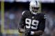 OAKLAND, CA - NOVEMBER 15: Aldon Smith #99 of the Oakland Raiders looks on during a timeout against the Minnesota Vikings in the third quarter of their NFL football game at O.co Coliseum on November 15, 2015 in Oakland, California. (Photo by Thearon W. Henderson/Getty Images)