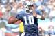 Titans Vince Young #10 looks to throw downfield during 1st half action between the Tennessee Titans and Jacksonville Jaguars on December 17, 2006 at LP Field in Nashville, Tennessee. (Photo by Joe Murphy/Getty Images)