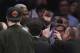 Former New York Knicks player Charles Oakley exchanges words with a security guard during the first half of an NBA basketball game between the New York Knicks and the LA Clippers Wednesday, Feb. 8, 2017, in New York. (AP Photo/Frank Franklin II)