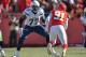 KANSAS CITY, MO - DECEMBER 28: Offensive tackle King Dunlap #77 of the San Diego Chargers gets set to block linebacker Tamba Hali #91 of the Kansas City Chiefs during the first half on December 28, 2014 at Arrowhead Stadium in Kansas City, Missouri. (Photo by Peter G. Aiken/Getty Images)