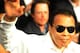 Boxing legend Muhammad Ali salutes the crowd before the start of the Floyd Mayweather Jr. and Shane Mosley welterweight fight at the MGM Grand Garden Arena on May 1, 2010 in Las Vegas, Nevada. AFP PHOTO / GABRIEL BOUYS (Photo credit should read GABRIEL BOUYS/AFP/Getty Images)