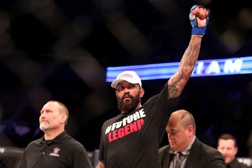 Liam McGeary is declared the victor after his light heavyweight title fight against Emanuel Newton at Bellator 134 on Friday, Feb. 27, 2015, in Uncasville, CT. McGeary won the fight via decision. (AP Photo/Gregory Payan)