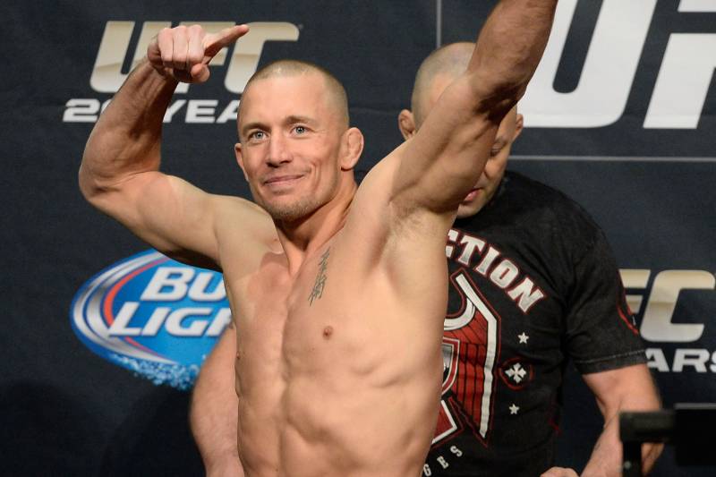 LAS VEGAS, NEVADA - NOVEMBER 15: Georges St-Pierre interacts with the crowd during the UFC 167 weigh-in event at the MGM Grand Garden Arena on November 15, 2013 in Las Vegas, Nevada. (Photo by Jeff Bottari/Zuffa LLC/Zuffa LLC via Getty Images)
