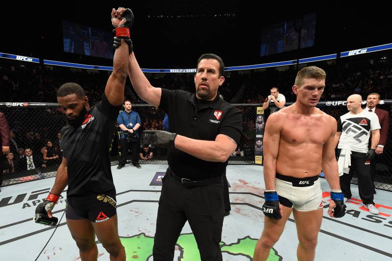 LAS VEGAS, NV - MARCH 04: Tyron Woodley (left) reacts to his victory over Stephen Thompson (right) in their UFC welterweight championship bout during the UFC 209 event at T-Mobile Arena on March 4, 2017 in Las Vegas, Nevada. (Photo by Josh Hedges/Zuffa LLC/Zuffa LLC via Getty Images)