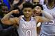 Kansas guard Frank Mason III (0) celebrates with teammates on the bench during the second half of the team's NCAA college basketball game against TCU in Lawrence, Kan., Wednesday, Feb. 22, 2017. Mason scored 20 points as Kansas defeated TCU 87-68. The Jayhawks clinched at least a tie for their 13th straight Big 12 title. (AP Photo/Orlin Wagner)