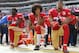 SANTA CLARA, CA - OCTOBER 02: (L-R) Eli Harold #58, Colin Kaepernick #7 and Eric Reid #35 of the San Francisco 49ers kneel on the sideline during the National Anthem prior to the game against the Dallas Cowboys at Levi's Stadium on October 2, 2016 in Santa Clara, California. (Photo by Thearon W. Henderson/Getty Images)