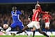 Chelsea's French midfielder N'Golo Kante (L) vies with Manchester United's French midfielder Paul Pogba during the English FA Cup quarter final football match between Chelsea and Manchester United at Stamford Bridge in London on March 13, 2017. / AFP PHOTO / Justin TALLIS / RESTRICTED TO EDITORIAL USE. No use with unauthorized audio, video, data, fixture lists, club/league logos or 'live' services. Online in-match use limited to 75 images, no video emulation. No use in betting, games or single club/league/player publications. / (Photo credit should read JUSTIN TALLIS/AFP/Getty Images)