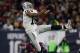 HOUSTON, TX - JANUARY 07: Andre Holmes #18 of the Oakland Raiders leaps to catch a pass against the Houston Texans in their AFC Wild Card game at NRG Stadium on January 7, 2017 in Houston, Texas. (Photo by Bob Levey/Getty Images)