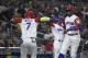SAN DIEGO, CA - MARCH 16: Gregory Polanco #25 of the Dominican Republic, right, is congratulated by Jose Reyes #7 after hitting a solo home run during the fifth inning of the World Baseball Classic Pool F Game Three between Venezuela and the Dominican Republic at PETCO Park on March 16, 2017 in San Diego, California. (Photo by Denis Poroy/Getty Images)