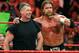 LAS VEGAS - AUGUST 24: World Wrestling Entertainment Inc. Chairman Vince McMahon (L) and wrestler Triple H appear in the ring during the WWE Monday Night Raw show at the Thomas & Mack Center August 24, 2009 in Las Vegas, Nevada. (Photo by Ethan Miller/Getty Images)